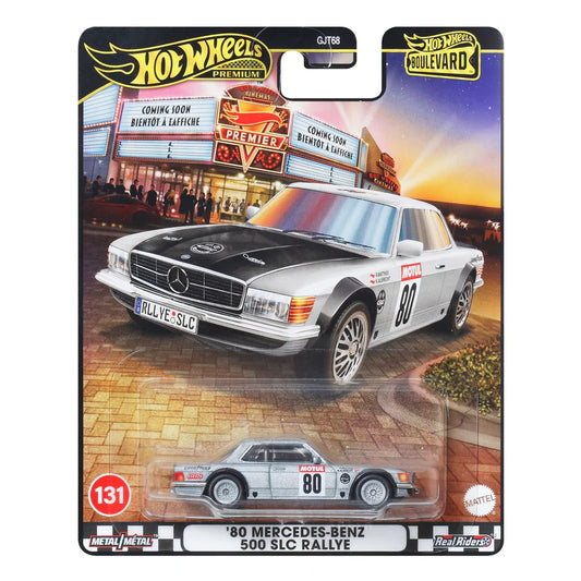 Hot Wheels '80 Mercedes-Benz 500 SLC Rallye toy car in packaging with a city street background.